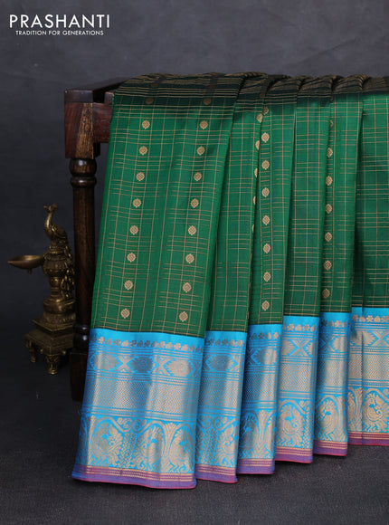 Pure gadwal silk saree green and teal blue with allover zari checks & buttas and zari woven korvai border
