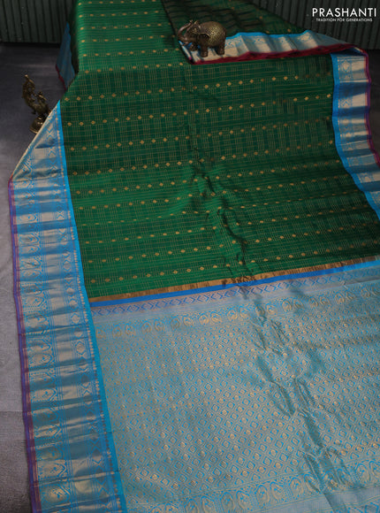 Pure gadwal silk saree green and teal blue with allover zari checks & buttas and zari woven korvai border