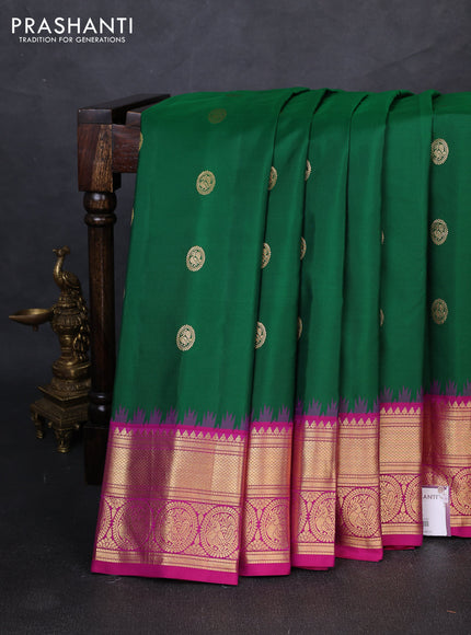 Pure gadwal silk saree green and pink with allover zari woven buttas and temple design zari woven border