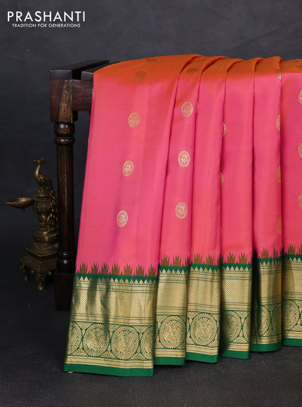 Pure gadwal silk saree dual shade of pinkish yellow and green with allover zari woven buttas and temple design zari woven border