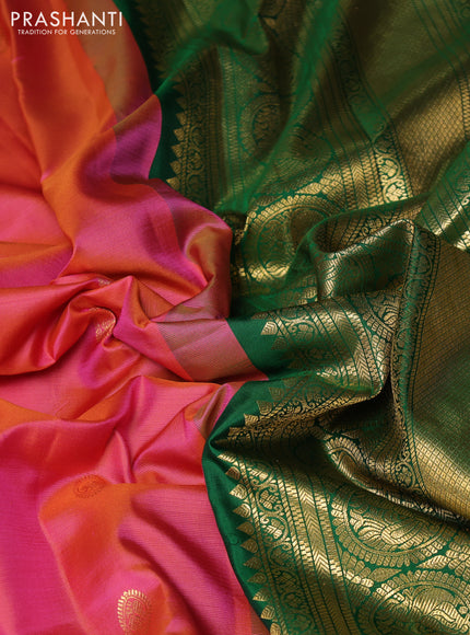 Pure gadwal silk saree dual shade of pinkish yellow and green with allover zari woven buttas and temple design zari woven border