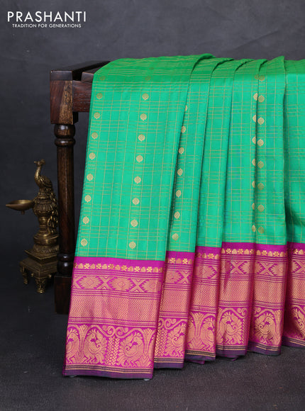 Pure gadwal silk saree light green and pink with allover zari checks & buttas and zari woven korvai border