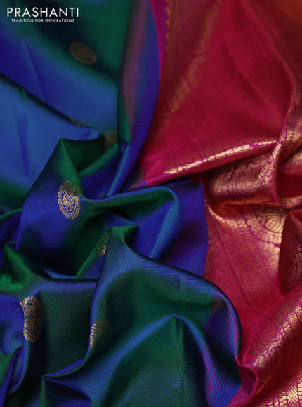 Pure gadwal silk saree dual shade of bluish green and pink with allover zarii woven buttas and temple design zari woven border