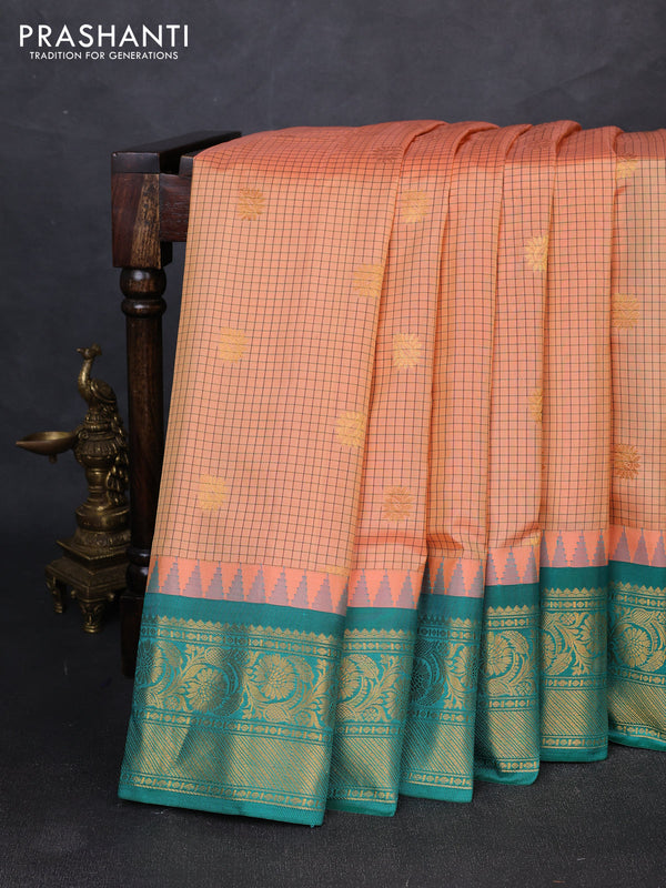 Pure gadwal silk saree peach shade and green with allover checks & zari woven buttas and temple design zari woven border