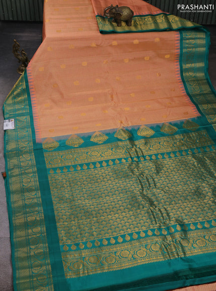 Pure gadwal silk saree peach shade and green with allover checks & zari woven buttas and temple design zari woven border