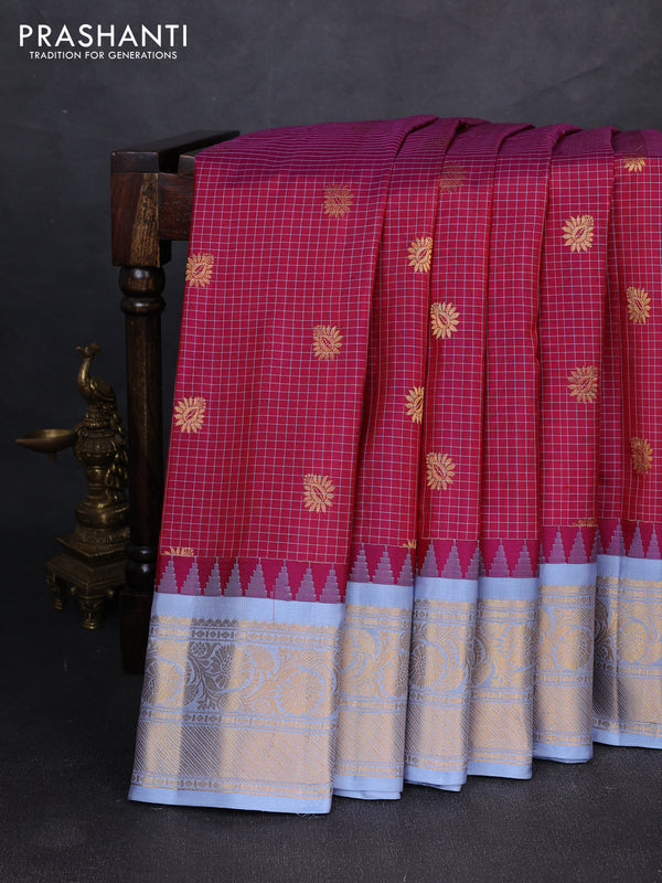 Pure gadwal silk saree magenta pink and pastel blue with allover checks & zari woven buttas and temple design zari woven border