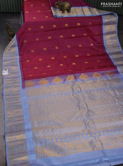 Pure gadwal silk saree magenta pink and pastel blue with allover checks & zari woven buttas and temple design zari woven border