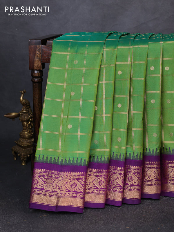 Pure gadwal silk saree green and purple with allover zari checks & buttas and temple design zari woven border