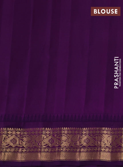 Pure gadwal silk saree green and purple with allover zari checks & buttas and temple design zari woven border