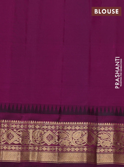 Pure gadwal silk saree blue and magenta pink with allover zari checks & buttas and temple design zari woven border