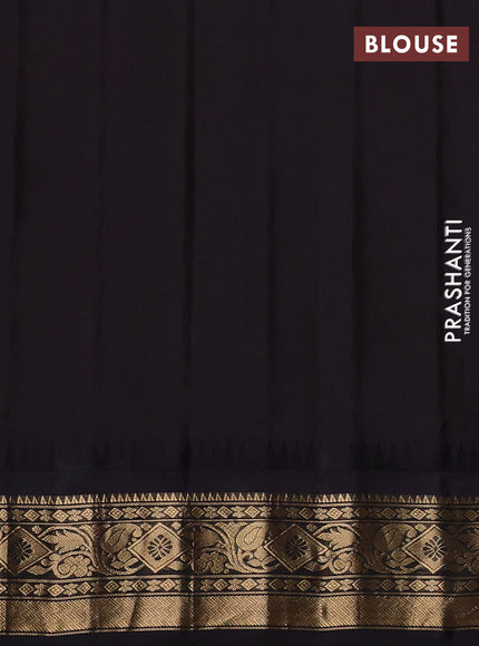 Pure gadwal silk saree yellow and coffee brown with allover zari checks & buttas and temple design zari woven border