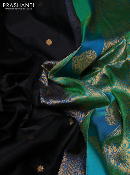 Pure gadwal silk saree black and dual shade of bluish green with allover zari woven buttas and temple zari woven border