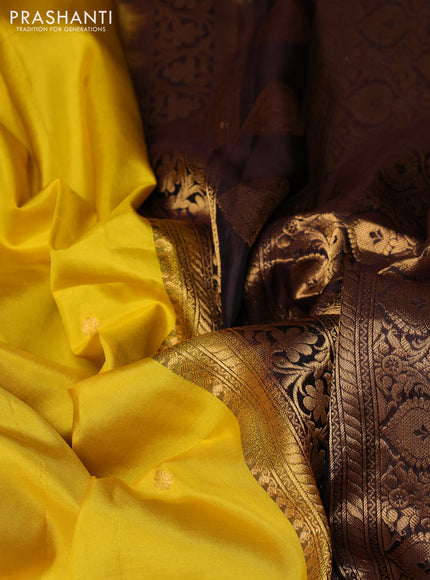 Pure gadwal silk saree yellow and coffee brown with allover zari woven buttas and temple zari woven border