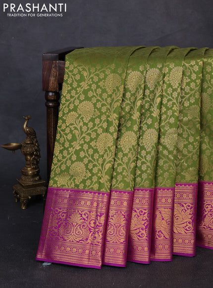 Kanchipuram silk saree light green and purple with allover zari woven brocade weaves and zari woven border