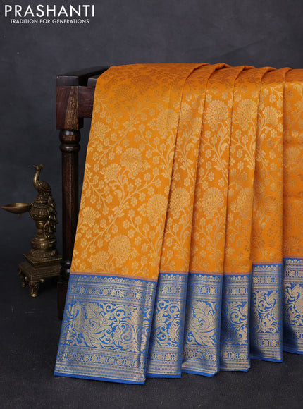 Kanchipuram silk saree mustard yellow and blue with allover zari woven brocade weaves and zari woven border