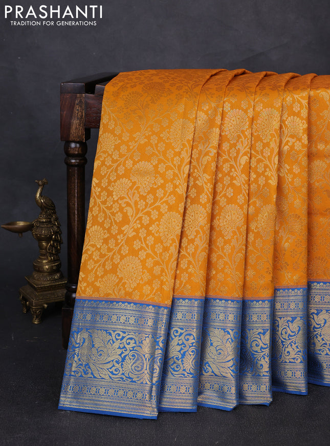 Kanchipuram silk saree mustard yellow and blue with allover zari woven brocade weaves and zari woven border