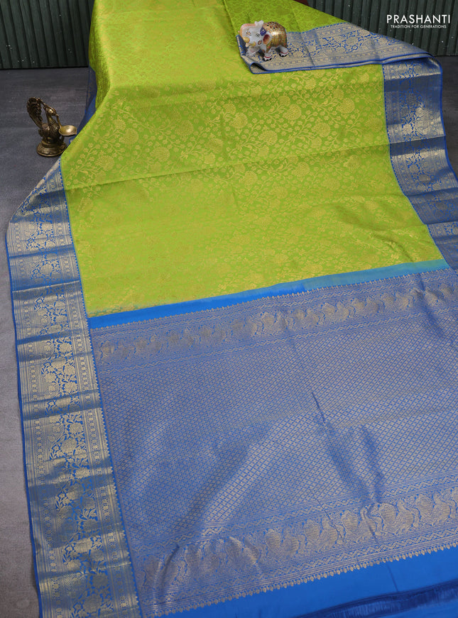 Kanchipuram silk saree light green and blue with allover zari woven brocade weaves and zari woven border
