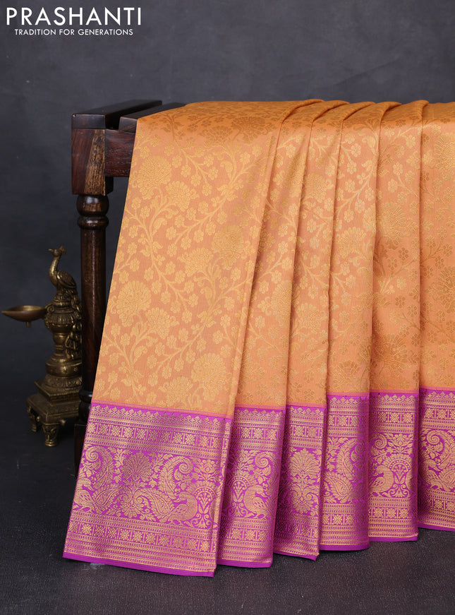 Kanchipuram silk saree pale orange and purple with allover zari woven brocade weaves and long zari woven border