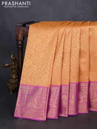 Kanchipuram silk saree pale orange and purple with allover zari woven brocade weaves and long zari woven border
