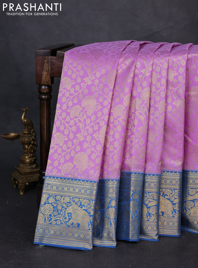 Kanchipuram silk saree lavender and blue with allover zari woven brocade weaves and zari woven border