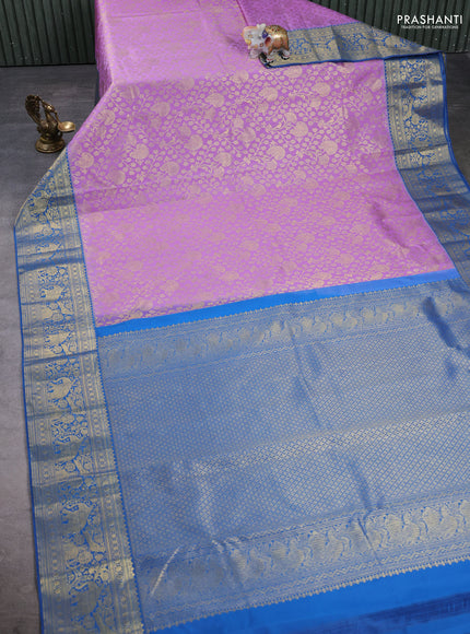 Kanchipuram silk saree lavender and blue with allover zari woven brocade weaves and zari woven border