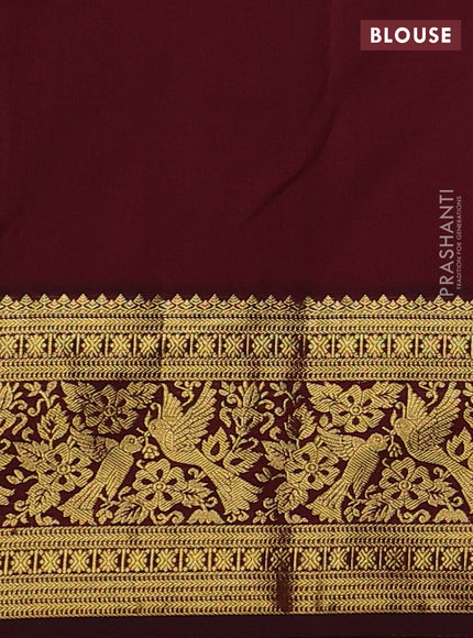 Kanchipuram silk saree maroon and deep maroon with allover zari woven brocade weaves and zari woven border