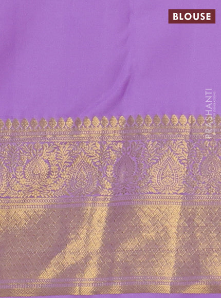 Kanchipuram silk saree purple and lavender with allover zari woven brocade weaves and long zari woven border
