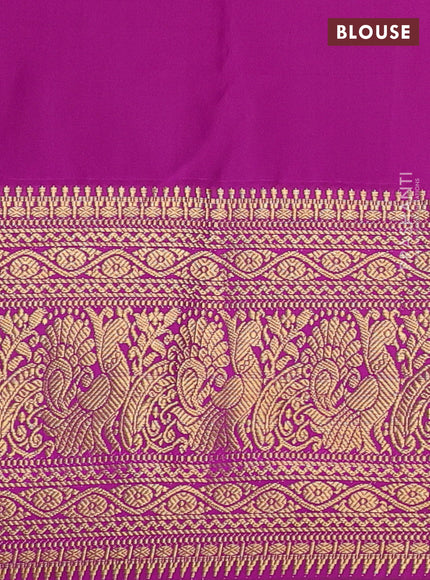Kanchipuram silk saree light green and magenta pink with allover zari woven brocade weaves and long zari woven border