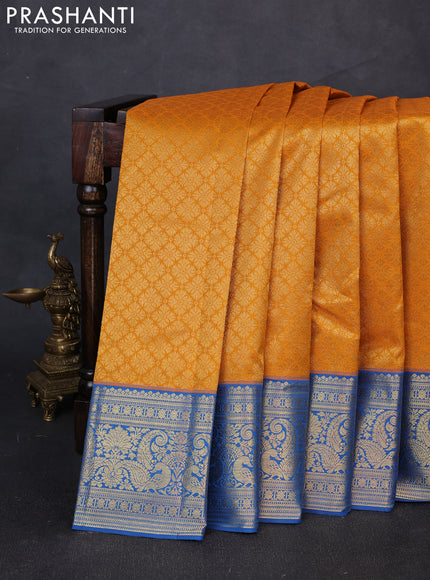 Kanchipuram silk saree mustard yellow and blue with allover zari woven brocade weaves and zari woven border