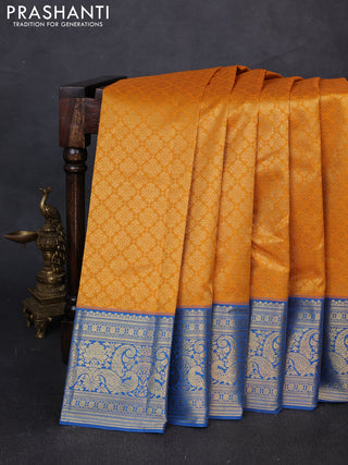 Kanchipuram silk saree mustard yellow and blue with allover zari woven brocade weaves and zari woven border