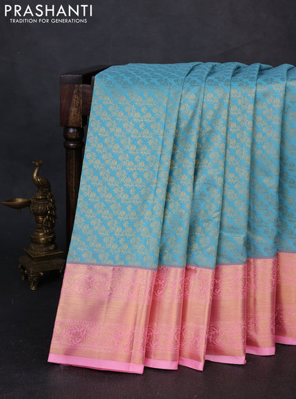 Kanchipuram silk saree light blue and light pink with allover zari woven brocade weaves and rich zari woven border