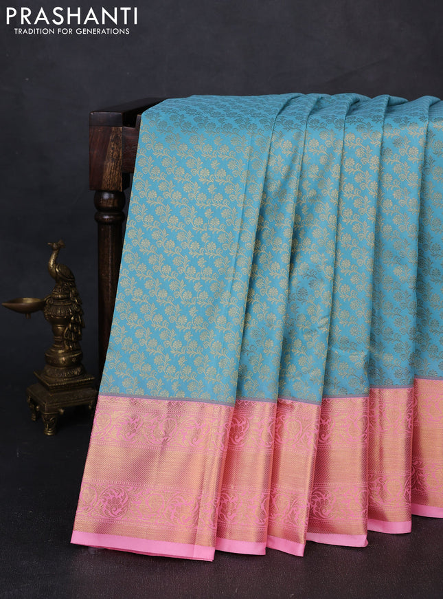 Kanchipuram silk saree light blue and light pink with allover zari woven brocade weaves and rich zari woven border