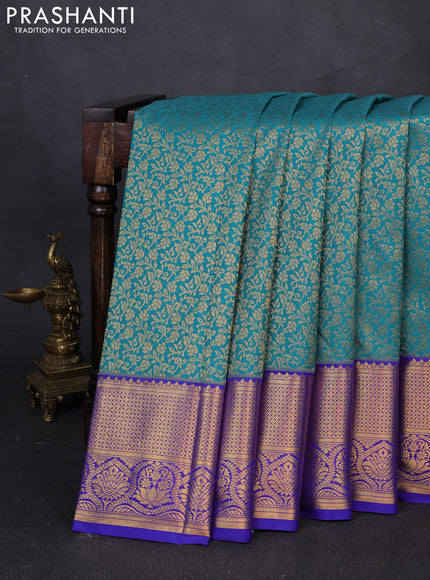 Kanchipuram silk saree teal green and violet with allover zari woven brocade weaves and zari woven border