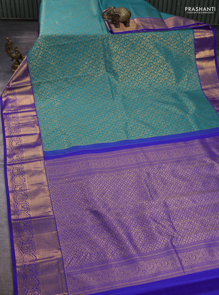 Kanchipuram silk saree teal green and violet with allover zari woven brocade weaves and zari woven border
