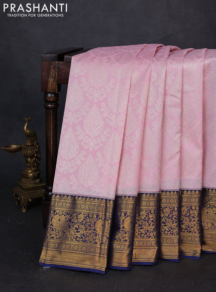 Kanchipuram silk saree light pink and navy blue with allover zari woven brocade weaves and zari woven border