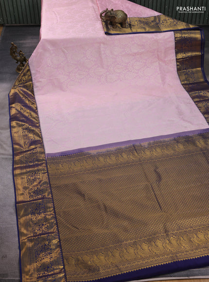 Kanchipuram silk saree light pink and navy blue with allover zari woven brocade weaves and zari woven border