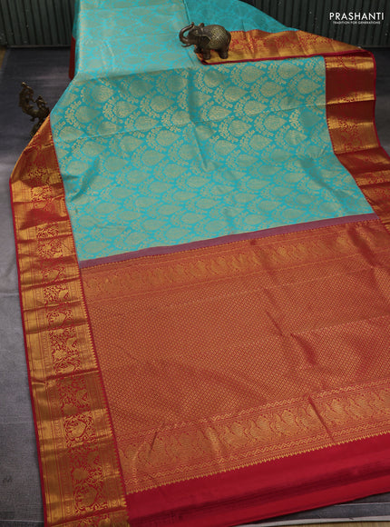 Kanchipuram silk saree teal green and red with allover zari woven brocade weaves and zari woven border