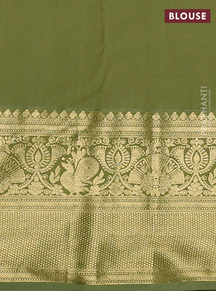 Kanchipuram silk saree mustard yellow and green shade with allover zari woven brocade weaves and long zari woven border