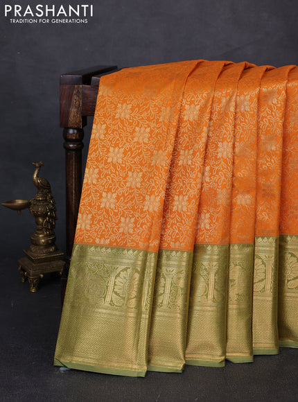 Kanchipuram silk saree dark mustard and green shade with allover zari woven brocade weaves and long zari woven border