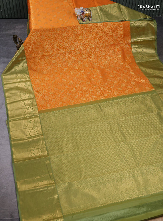 Kanchipuram silk saree dark mustard and green shade with allover zari woven brocade weaves and long zari woven border