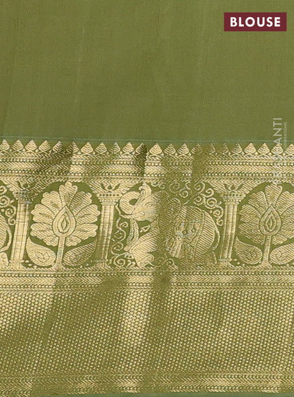Kanchipuram silk saree dark mustard and green shade with allover zari woven brocade weaves and long zari woven border