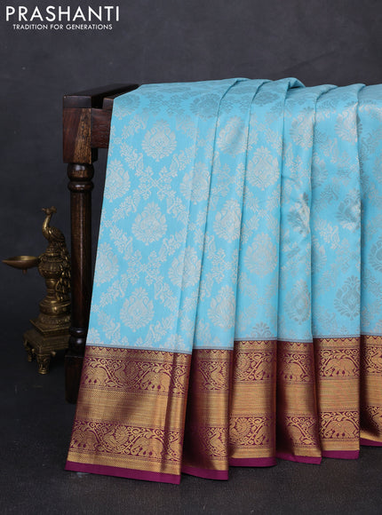 Kanchipuram silk saree light blue and purple with allover zari woven brocade weaves and rich zari woven border