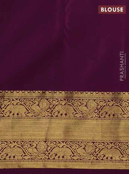Kanchipuram silk saree light blue and purple with allover zari woven brocade weaves and rich zari woven border