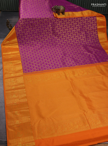 Kanchipuram silk saree purple and orange with allover zari woven brocade weaves and long zari woven border