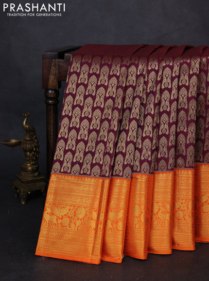 Kanchipuram silk saree wine shade and orange with allover zari woven brocade weaves and long zari woven border