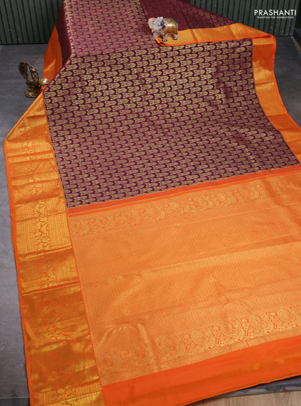 Kanchipuram silk saree wine shade and orange with allover zari woven brocade weaves and long zari woven border