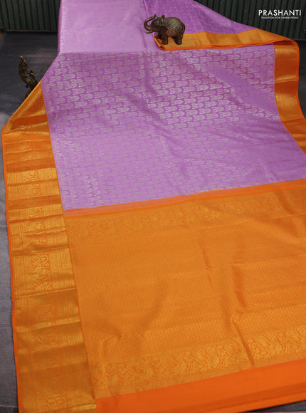 Kanchipuram silk saree lavender and orange with allover zari woven brocade weaves and zari woven border