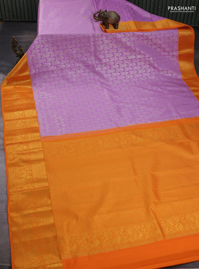 Kanchipuram silk saree lavender and orange with allover zari woven brocade weaves and zari woven border