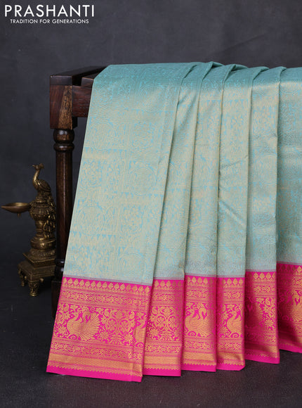 Kanchipuram silk saree tela blue and pink with allover zari woven brocade weaves and zari woven border