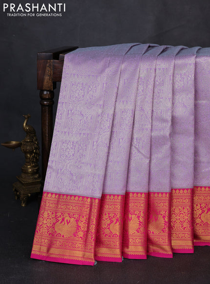 Kanchipuram silk saree lavender and pink with allover zari woven brocade weaves and zari woven border